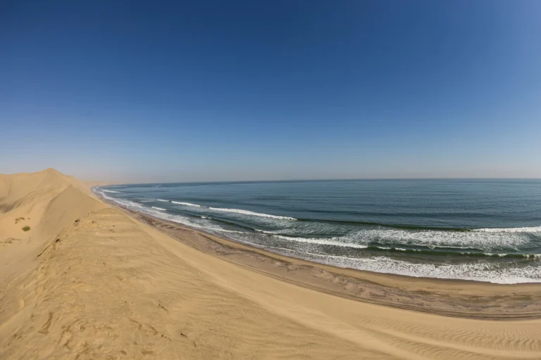 Namib Desert dunes meeting the Atlantic Ocean