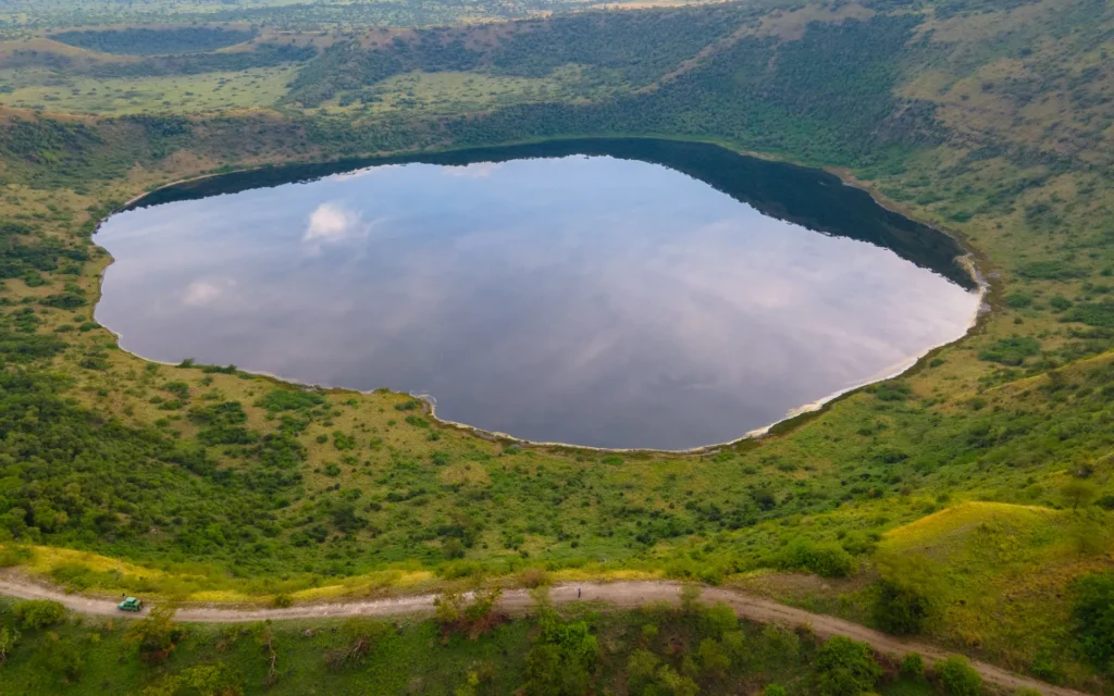 Aerial view of a crater lake in Queen Elizabeth National Park